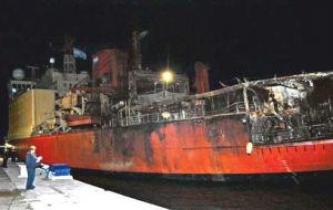 ARA Irizar with its fire ravaged bow docked in Puerto Belgrano