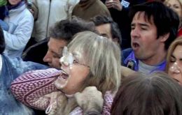 Protesters toss eggs, flour at sister of Argentine president during protest