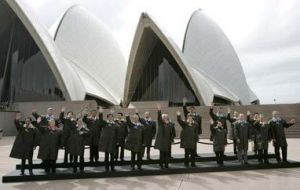 APEC leaders pose for a family photo at the Sydney Opera House
