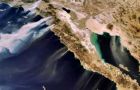 A European Space Agency photo shows desert winds blowing smoke from wildfires in Southern California