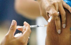 A person is vaccinated against yellow fever in a public hospital in Brasilia