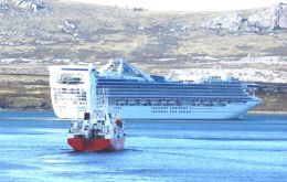 Fishery Patrol Vessel <i>Dorada</i> is dwarfed by the cruise ship <i>Star Princess</i> in Port William this month.