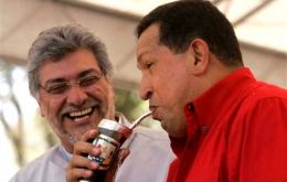 Pte. Lugo, reacts as  Pte. Chavez drinks “terere”, a traditional cold herbal tea