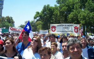  Workers marched through downtown Santiago