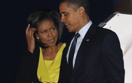 Pte. Obama and his wife Michellearrive at Stansted Airport
