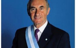 President Fernando de la Rúa with the sash and baton in happier times