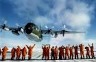 Ground crew farewell a Hercules C-130 at Marambio base