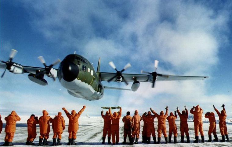 Ground crew farewell a Hercules C-130 at Marambio base
