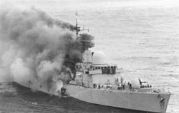 HMS Sheffield burning following the hit by an Exocet