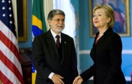 Hillary Clinton and Brazilian Foreign Secretary Celso Amorim.
