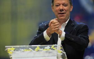 Juan Manuel Santos celebrates at the victory rally
