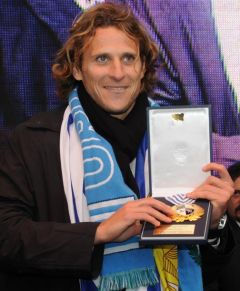 World’s Cup's best player Diego Forlan receive a medal with the Uruguayan crest