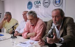 The leaders of the four farm workers groups at a press conference.