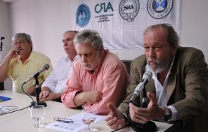 The leaders of the four farm workers groups at a press conference.