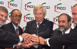 Members of India and Uruguay chambers of commerce celebrate the agreement (The Hindu courtesy)  