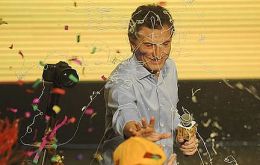 Macri celebrating with his running mate at party headquarters 