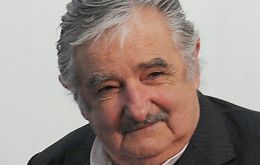 President Mujica says those outlays not considered necessary will be the first to go