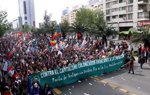 Indigenous minorities marched in Santiago to protest 12 October 1492 