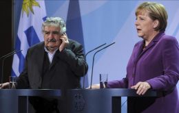 The German Chancellor and Uruguayan president Jose Mujica 