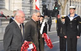 Association Chairman David Tatham and Falklands Councillor Dick Sawle go forward to lay their wreaths