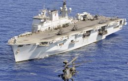 HMS Ocean, the largest ship in the Royal Navy's fleet, which will be berthed in the Thames at Greenwich