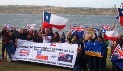 Chileans sang their national anthem and together with Islanders displayed the three flags  