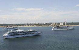 Several cruise vessels in the Bay of Maldonado waiting to land thousands of visitors 