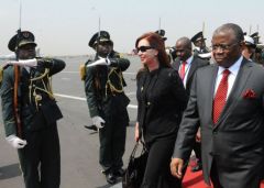 President Cristina Fernandez is met at the airport by Angolan officials