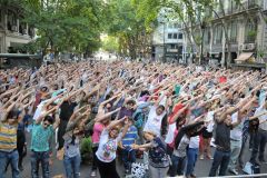 There were about 2000 people standing and dancing in an open- air show in the historic Avenida Mayo, Buenos Aires