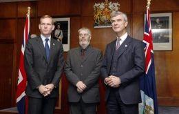 Minister Browne next to MLA Gavin Short and Falklands’ Governor Nigel Haywood (Photo: Reuters)