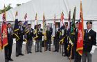 Veterans organisations pose with their colours