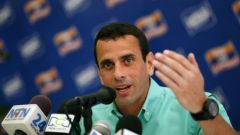  The opposition unity candidate displays youth, physical fitness and never mentions Chavez, whom he refers to as the &lsquo;government&rsquo;s candidate&rsquo;