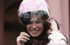 Cristina with her special colours helmet on making the announcement