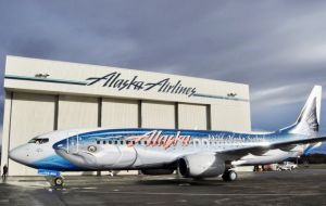 Alaska Airlines reveals its fish-patterned Boeing 737-800 (N559AS) dubbed “Salmon-Thirty-Salmon II.” (Photo by Alaska Airlines)