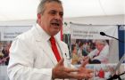 Health minister Jaime Mañalich announcing details of the vaccination campaign