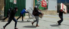 Adolescents break in while the women to for food, men for alcohol and teenagers for LCDTVs