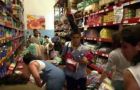 Women and teenagers looting the food stalls