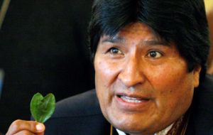 President Morales in one of his many trips abroad chewing a coca leaf
