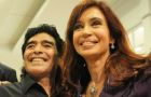 The former football star meets with Cristina Fernandez in Abu Dhabi and says Argentines should be proud of her and her government