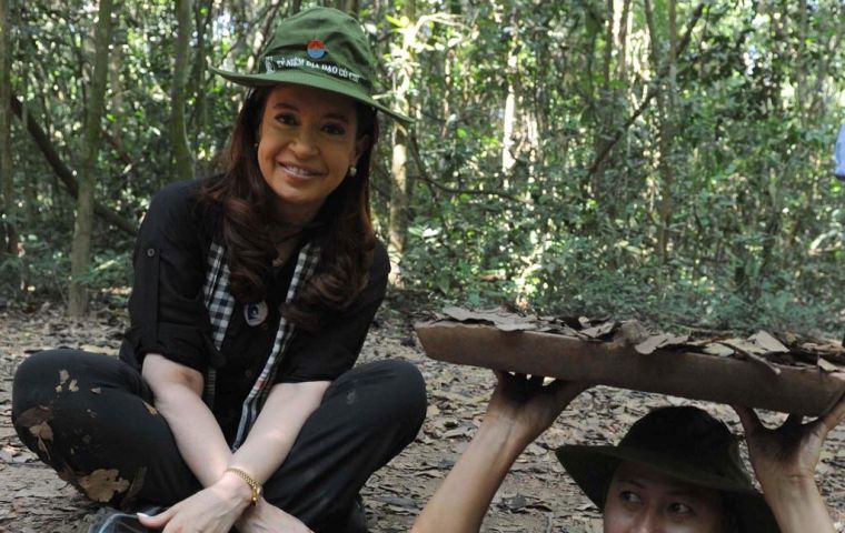 The Argentine president dressed in guerrila gear at the Cu Chi tunnels  