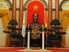 Cristina Fernandez and Truong Tan Sang with Ho Chi Minh overlooking