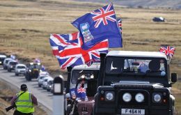 Falkland Islanders in a massive concentration displaying the Union Jack  (Photo: M. Short)