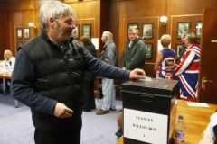 MLA Gavin Short voting at the Chambers in Stanley (Pic EFE)