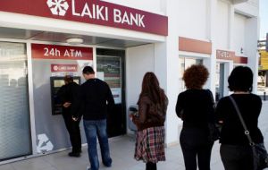 Cypriots lining up to try and recover their funds and deposits
