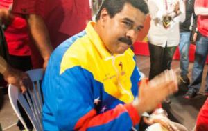 Maduro, the burly former bus driver plays music and warns of the Maracapana curse  