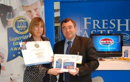 Beauchene Fishing Company owner Cheryl Roberts, as Director of South Atlantic Squid Ltd and Igueldo Fisheries (F.I.) Ltd, accepts the Superior Taste Award for Falkland Islands Patagonian Squid awarded