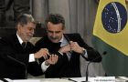 Rossi and Amorim signing the joint statement on closer cooperation