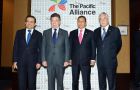 The three presidents, and Mexico’s trade minister (L) at the conference
