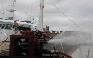 Uruguayan fire brigades working on the vessel (Photo El Pais)