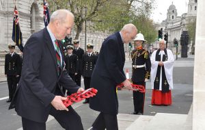 Colonel Mike Bowles laying the wreath for the 1982 veterans organisation SAMA-82 and Mr. Stuart Leeming laying the wreath for the Falklands Families Association